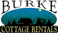 Burke Cottage Rentals logo with black cottages under a blue night sky and moon, gold text on white background