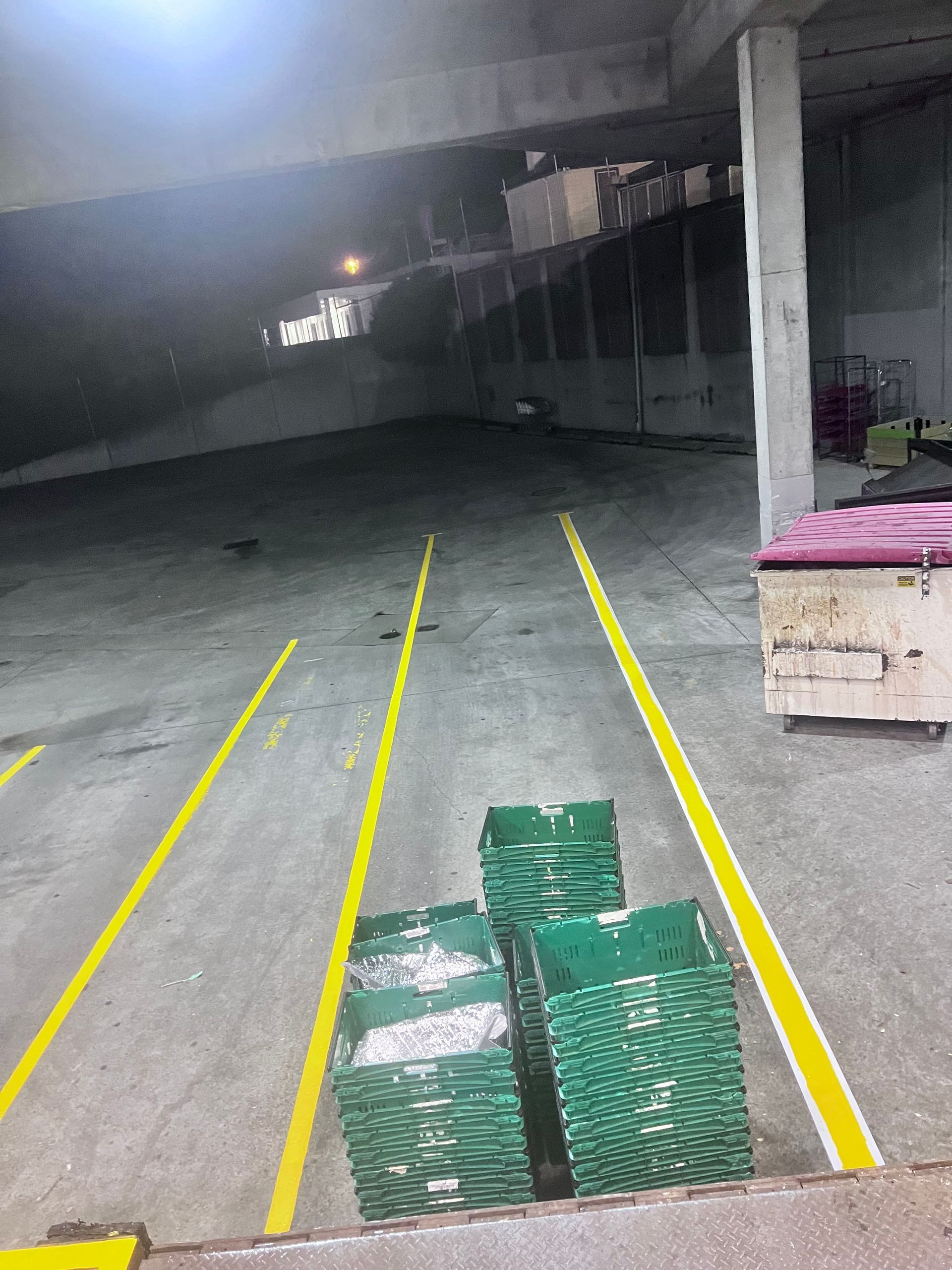 A parking lot with yellow lines and green crates — Hobart, TAS — Campbell Painters Pty Ltd