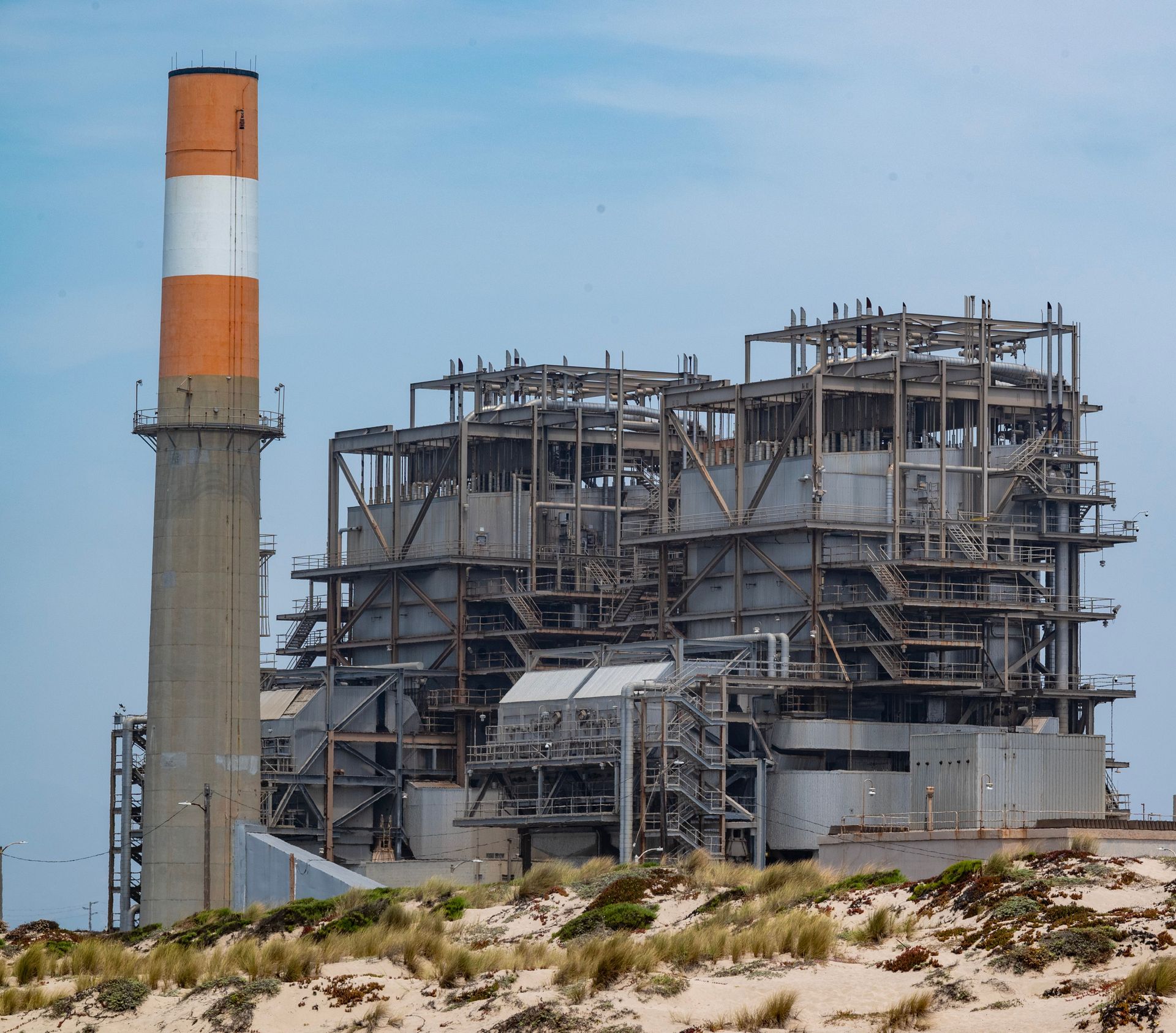 Battery Energy Storage System (BESS) within a secure, gated facility, emphasizing controlled access and enhanced security for critical infrastructure.