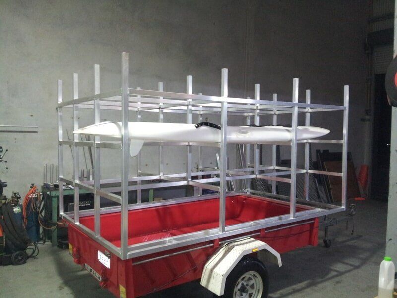Red Trailer With a Custom Aluminum Rack — Litzow’s Welding & Fabrication in Dundowran, QLD