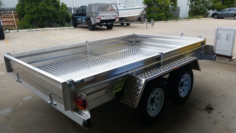 Silver Utility Trailer With Diamond Plate Fenders — Litzow’s Welding & Fabrication in Dundowran, QLD
