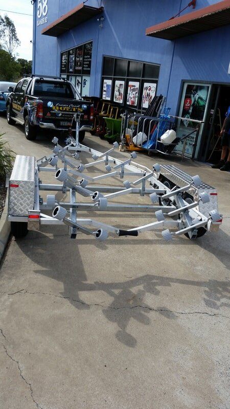 Boat Trailer Parked in Front of a Blue Storefront — Litzow’s Welding & Fabrication in Dundowran, QLD