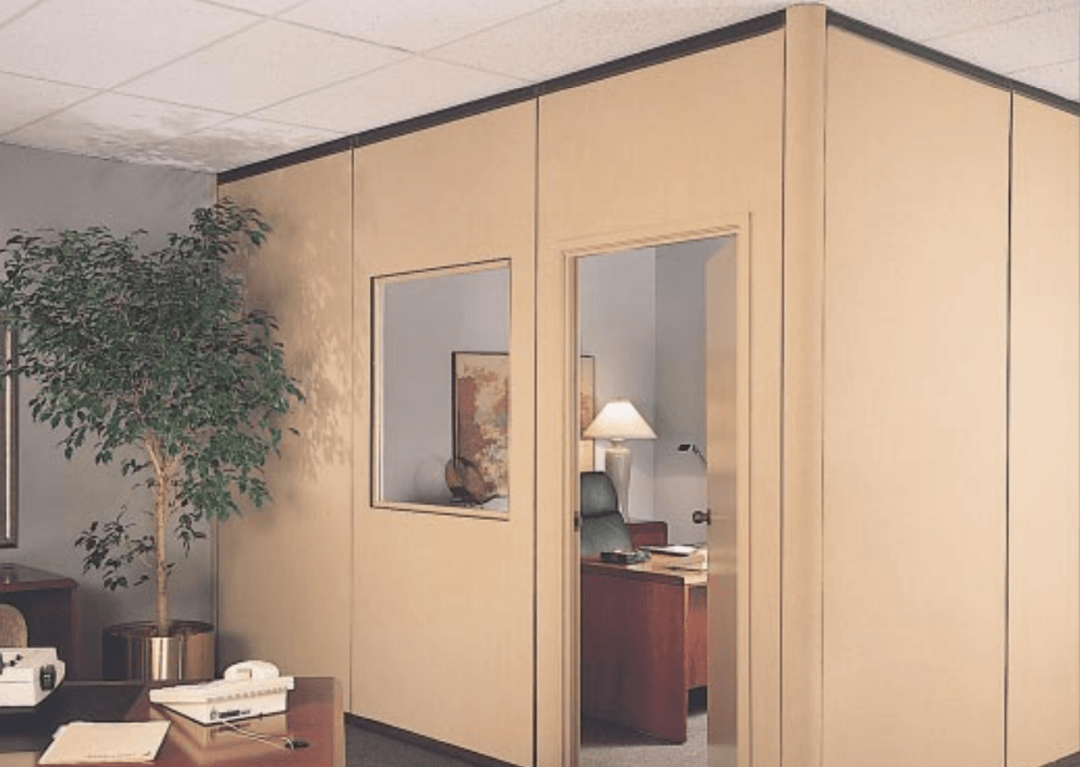 A large room with a lot of glass doors and tables and chairs.