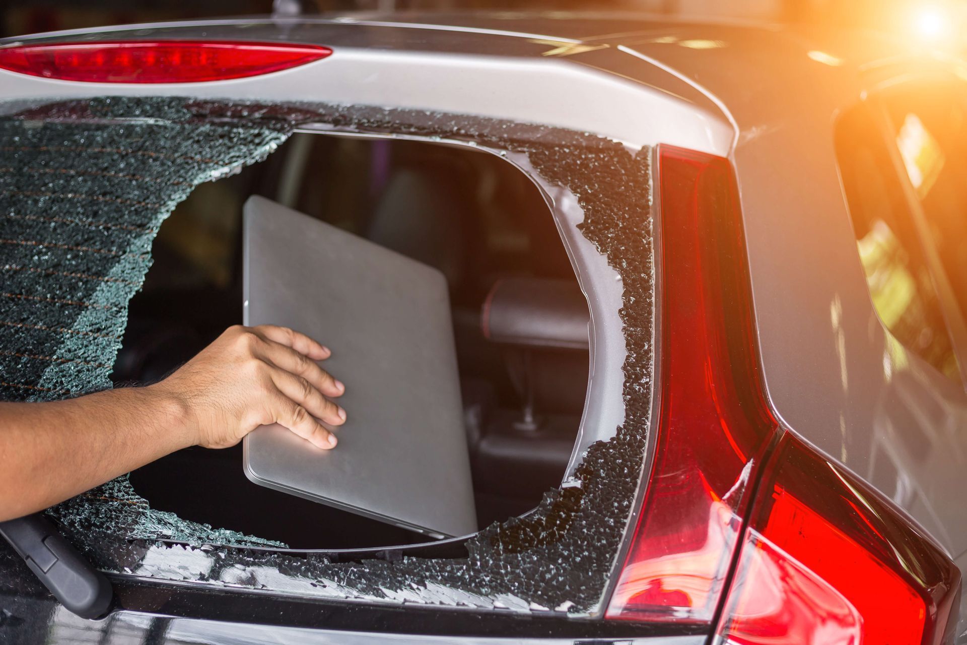 Laptop Stolen From Side Window
