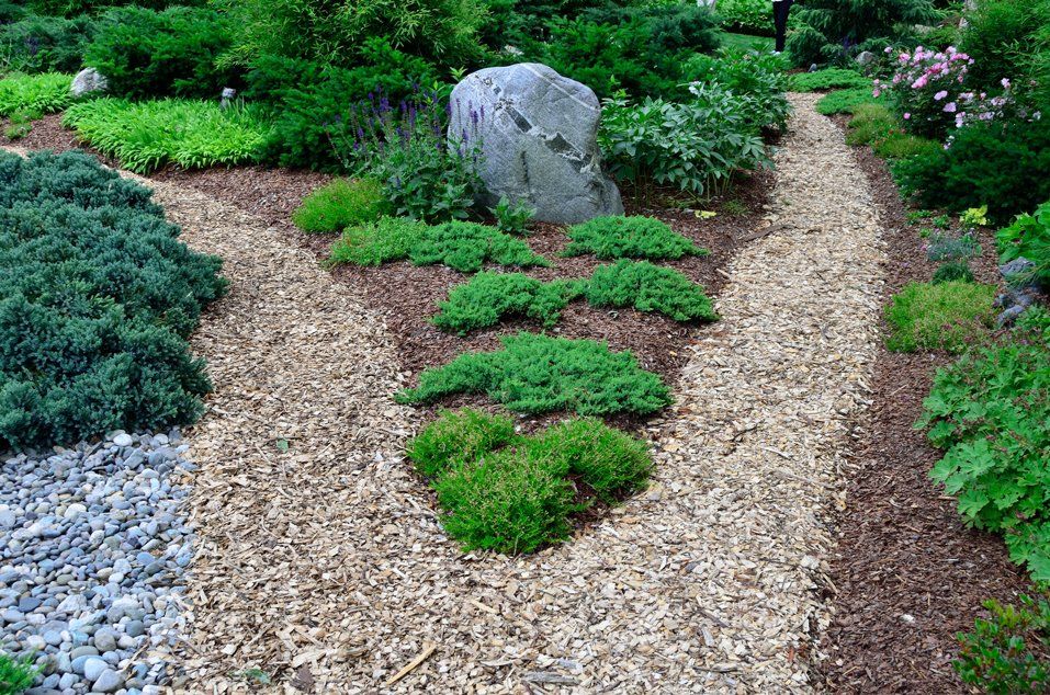 Mulching — Columbus, OH — A Woman’s Touch Tree Care