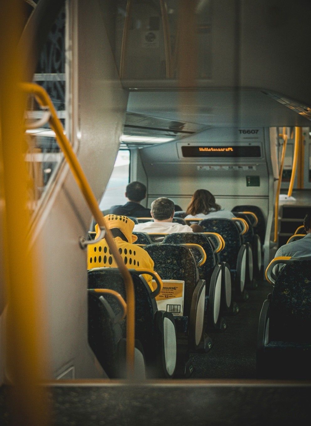 Passengers Seated on A City Bus — Brightside Buyers Agency in Dundas, NSW