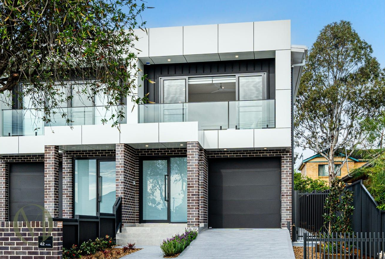A Modern Two-story Townhouse With White Paneling, Brick Accents — Brightside Buyers Agency in Parramatta, NSW