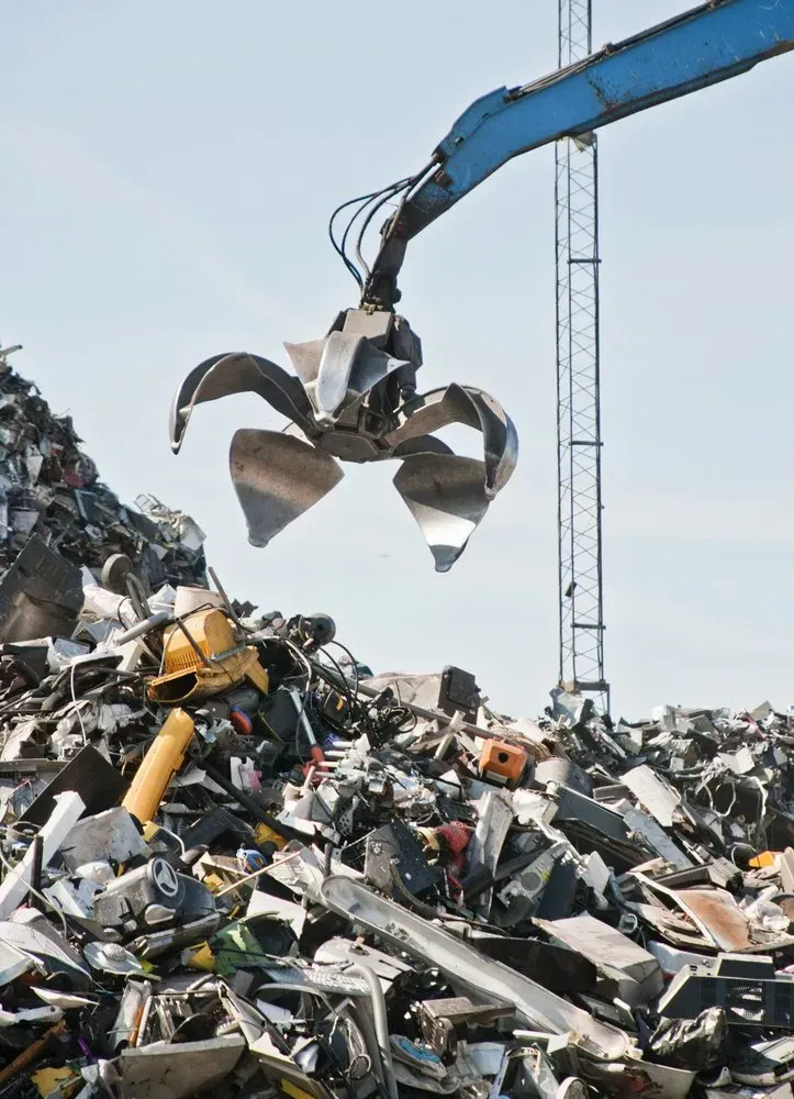 Crane Claw Gripping Metal Scrap in a Junkyard — Independent Scrap Metal Pty Ltd in Evans Head, NSW