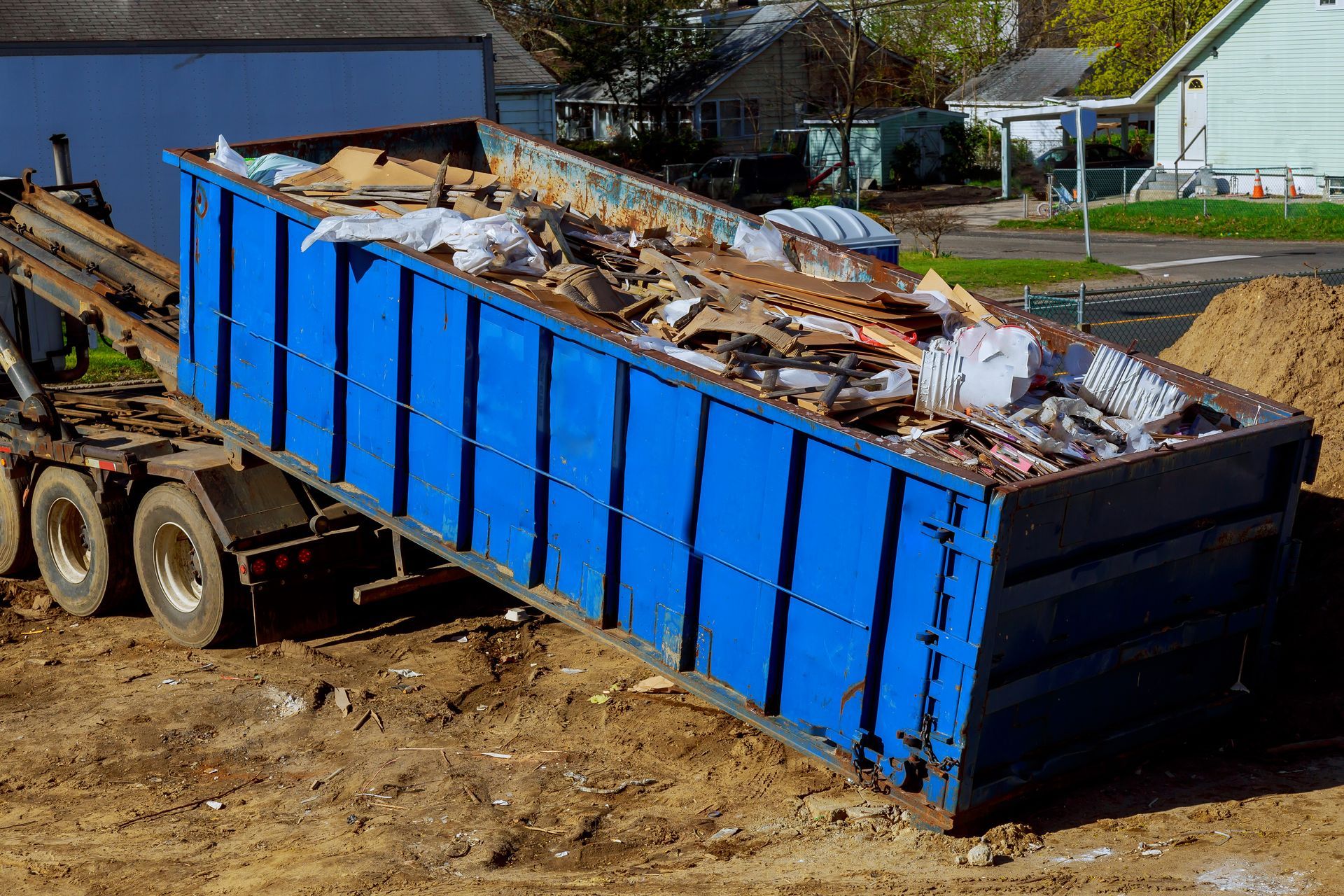 A Mechanical Claw Loading Scrap Metal Into a Railway Car — Independent Scrap Metal Pty Ltd in Ballina, NSW