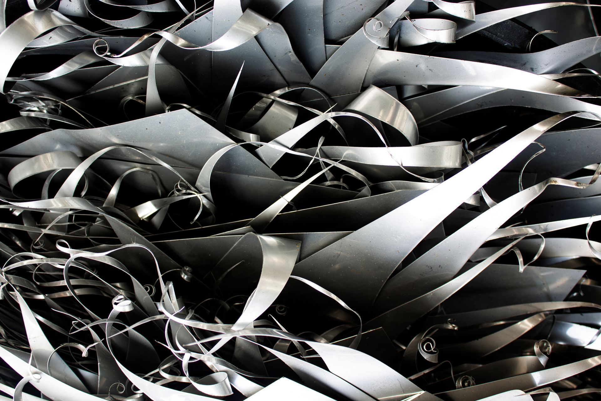 Close-up of a Pile of Shiny, Gray Metal Shavings, Possibly Industrial Waste — Independent Scrap Metal Pty Ltd in Maclean, NSW