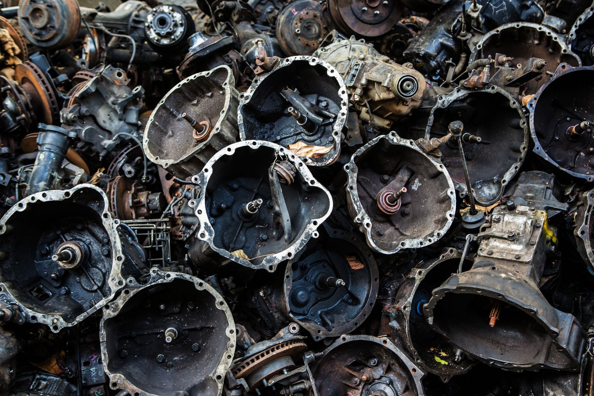 Pile of Old, Open Black Metal Casings and Automotive Parts — Independent Scrap Metal Pty Ltd in Mullumbimby, NSW