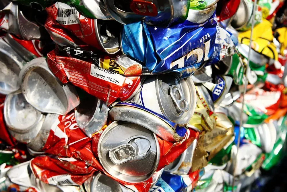 Crushed Aluminum Cans, Red, Blue, Silver, and Yellow — Independent Scrap Metal Pty Ltd in Tenterfield, NSW