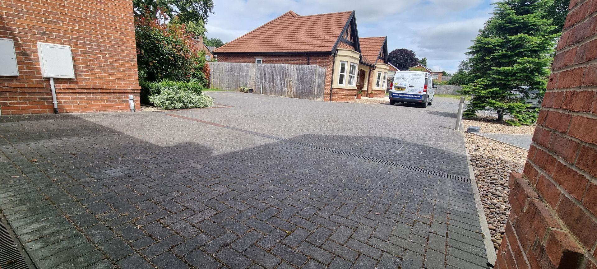 Grey Block Paved Driveway Before Pressure Washing Clean