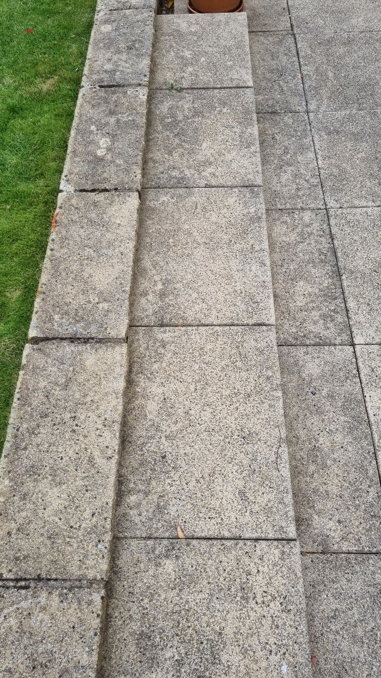 A concrete driveway after a professional driveway clean.