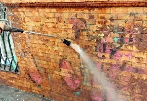 Steam Cleaning Graffiti from wall