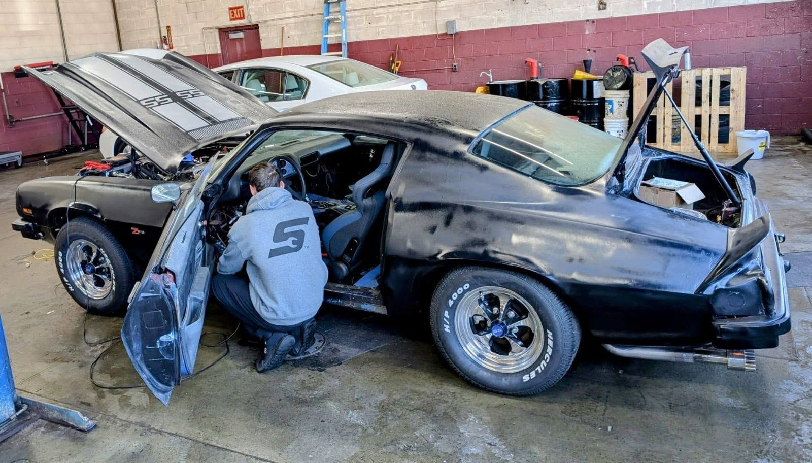 Mechanic Doing Maintenance | Rollins Automotive