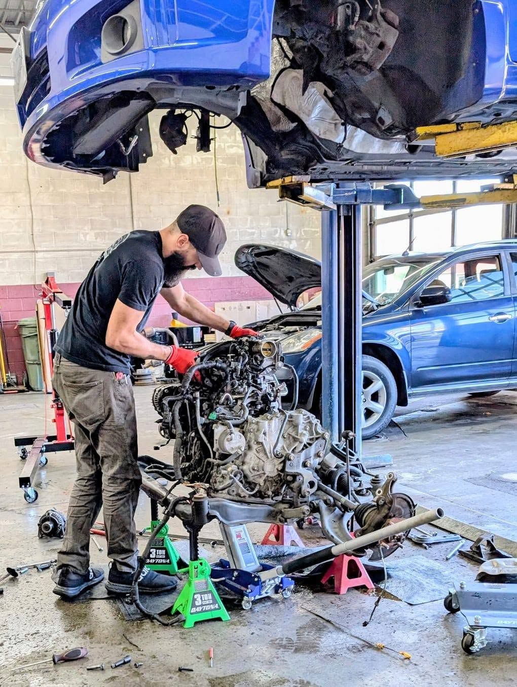 Mechanic Undergoing Maintenance | Rollins Automotive