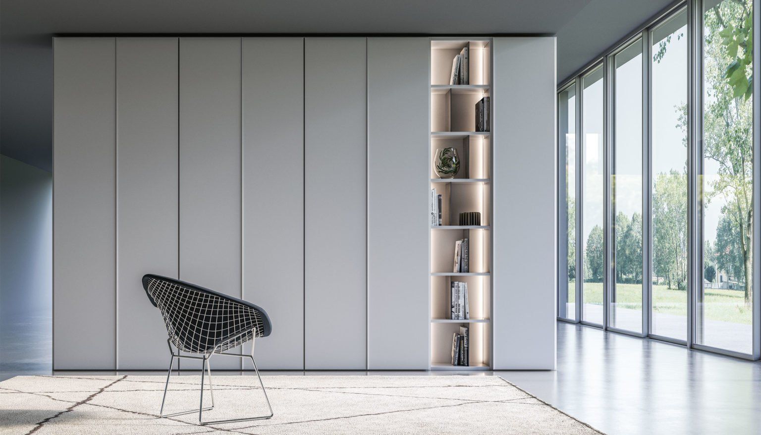 Moderno armadio bianco con libreria incorporata, sedia nera e ampie finestre con vista sull'esterno.