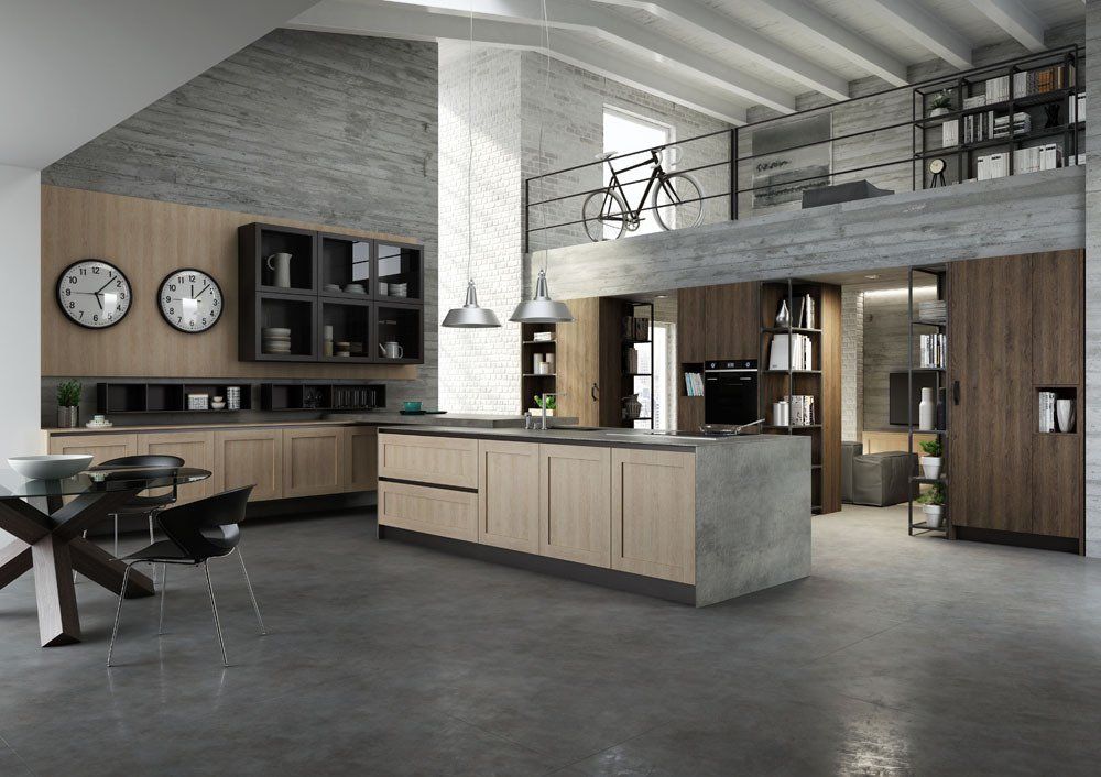 Moderna cucina loft con isola in cemento e mobili in legno, soppalco con bicicletta.