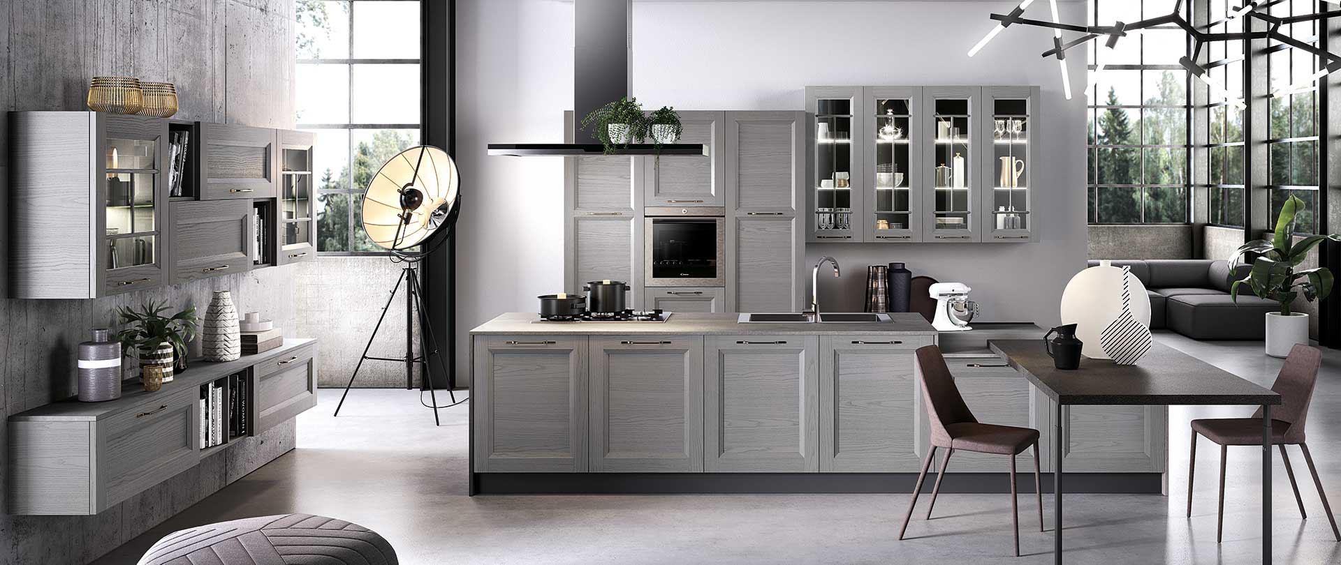 Moderna cucina grigia con mobili, elettrodomestici e tavolo da pranzo.