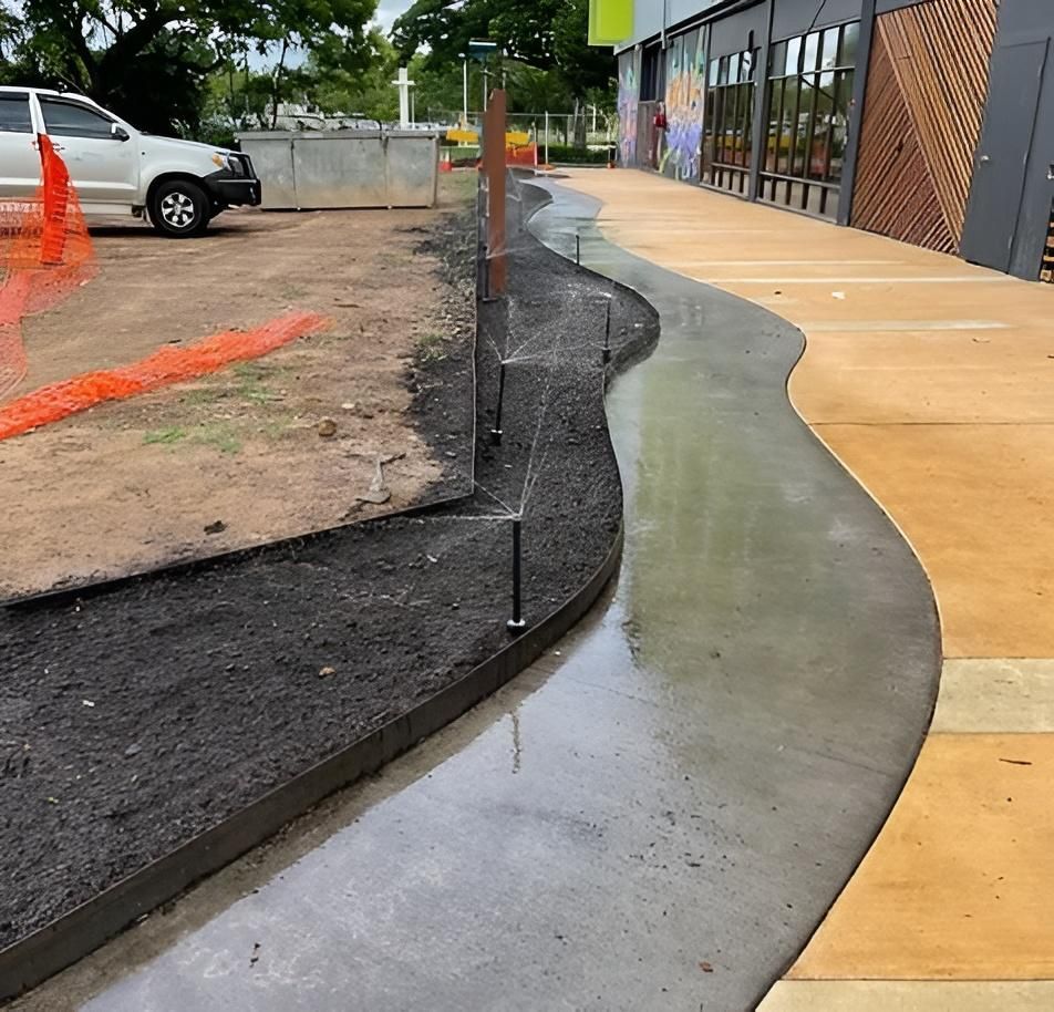 Installation of Irrigation on Sidewalk — iWater NT Pty Ltd in Yarrawonga, NT