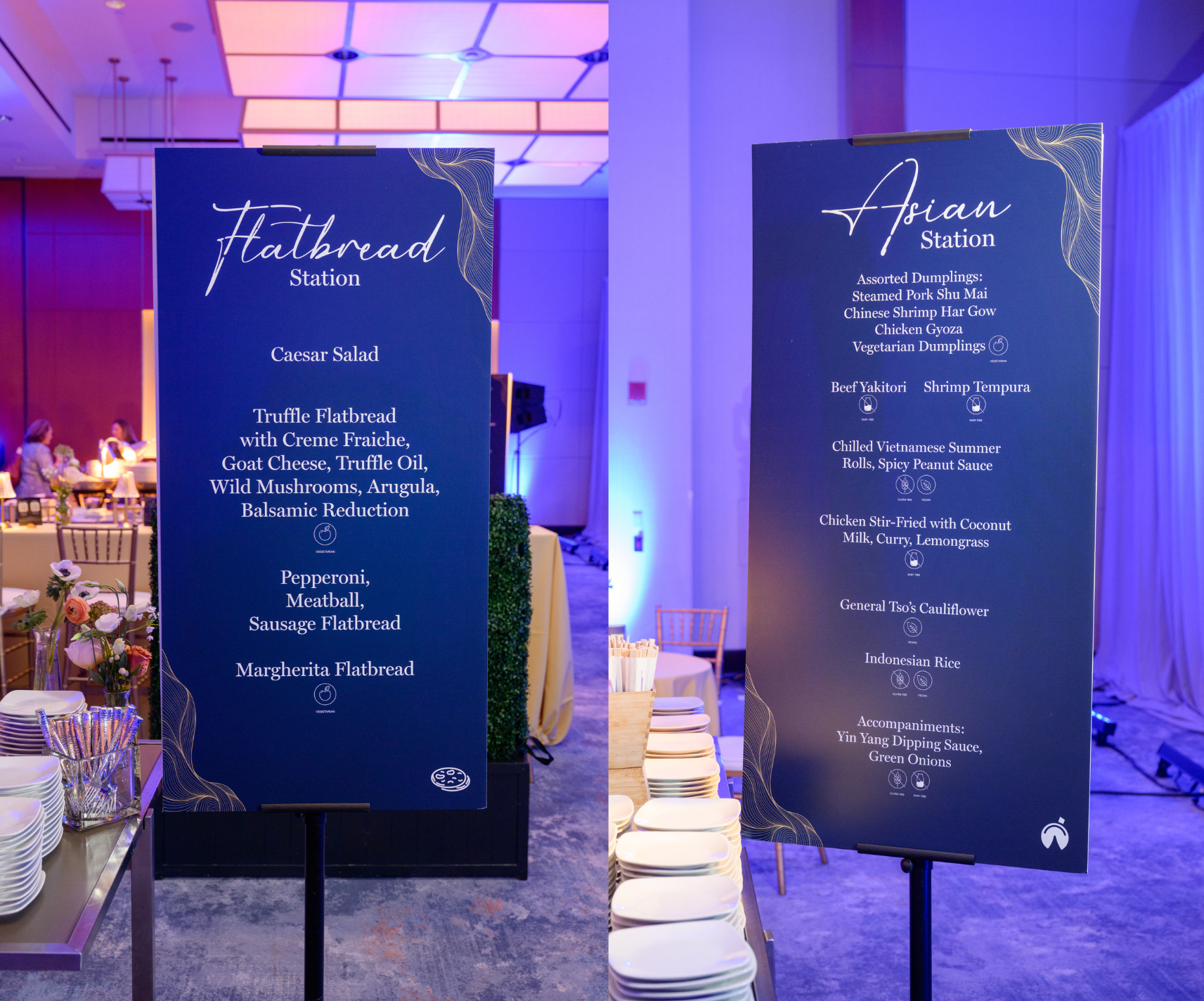 Two black banquet menu signs under purple lighting at a catered event entrance
