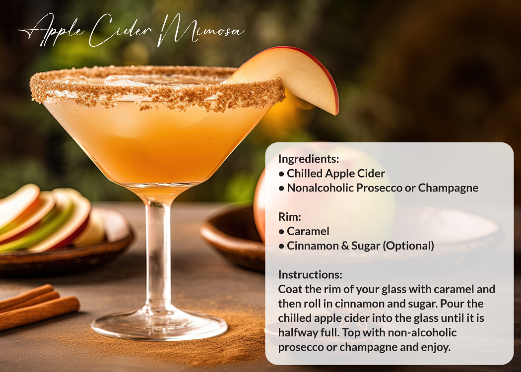 A martini glass with a slice of apple on the rim.