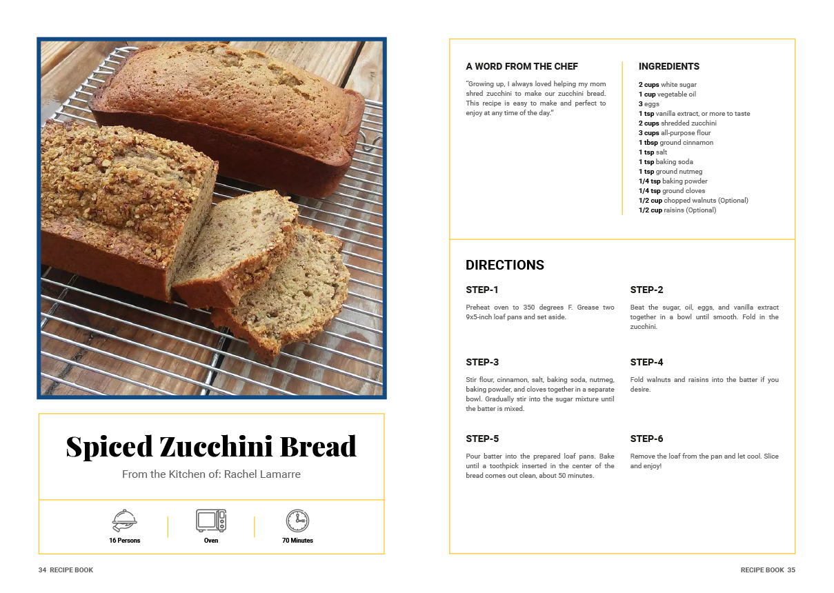 A loaf of spiced zucchini bread is sitting on a cooling rack.