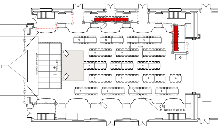 A black and white floor plan of a room with tables and chairs