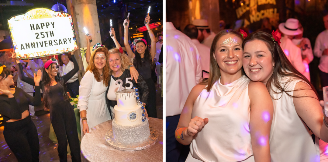 Two women are standing next to a cake at a party.