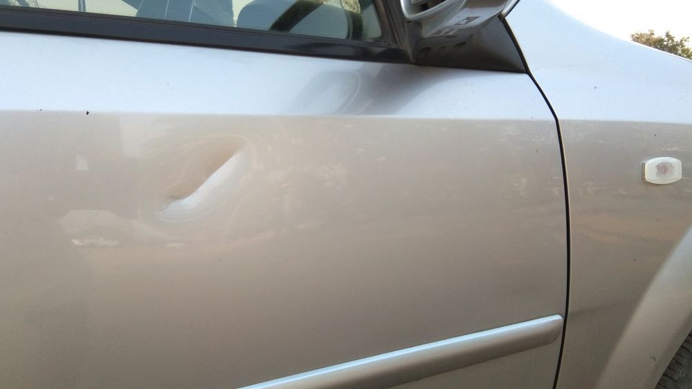 A Car with A Damaged Door — Mahers Smash Repairs in Nundle, NSW