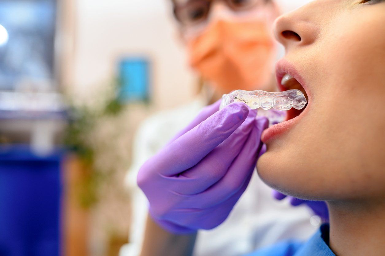 invisalign clear aligner patient