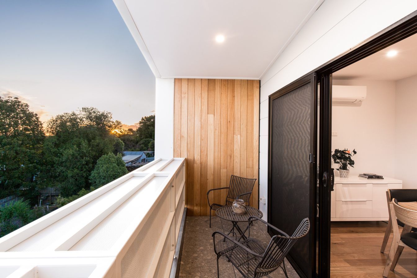 Balcony With A Table and Chairs On It — Jetsonian Constructions In Wendouree, VIC
