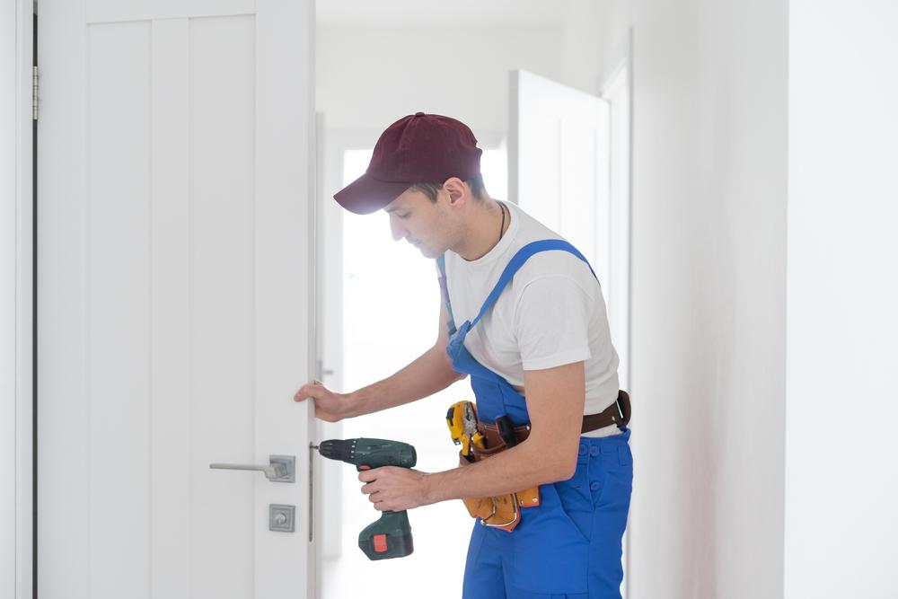Locksmith Installing Door Lock System — Lock Repairs in Home Hill, QLD