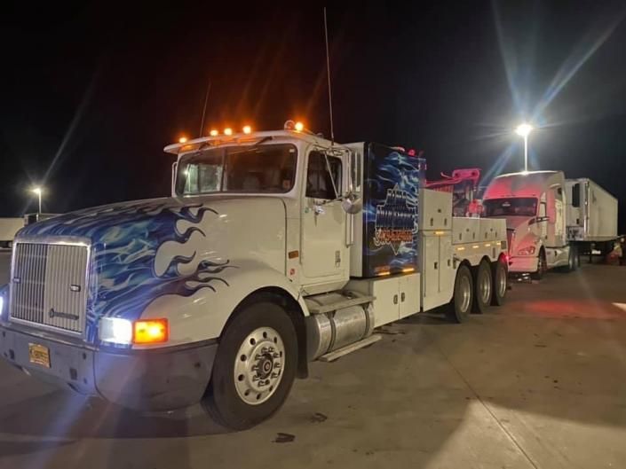 tow truck at night