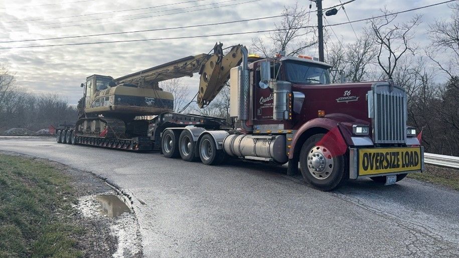 A truck on a flatbed trailer