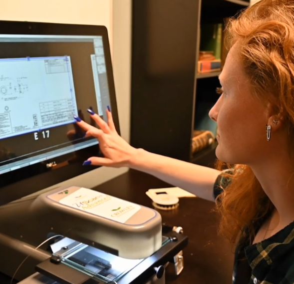 a woman is using a computer