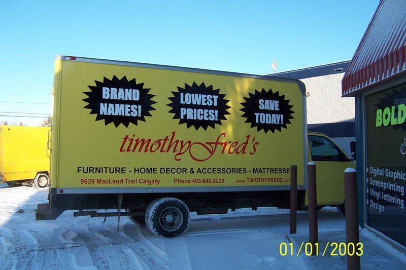 Yellow delivery truck with