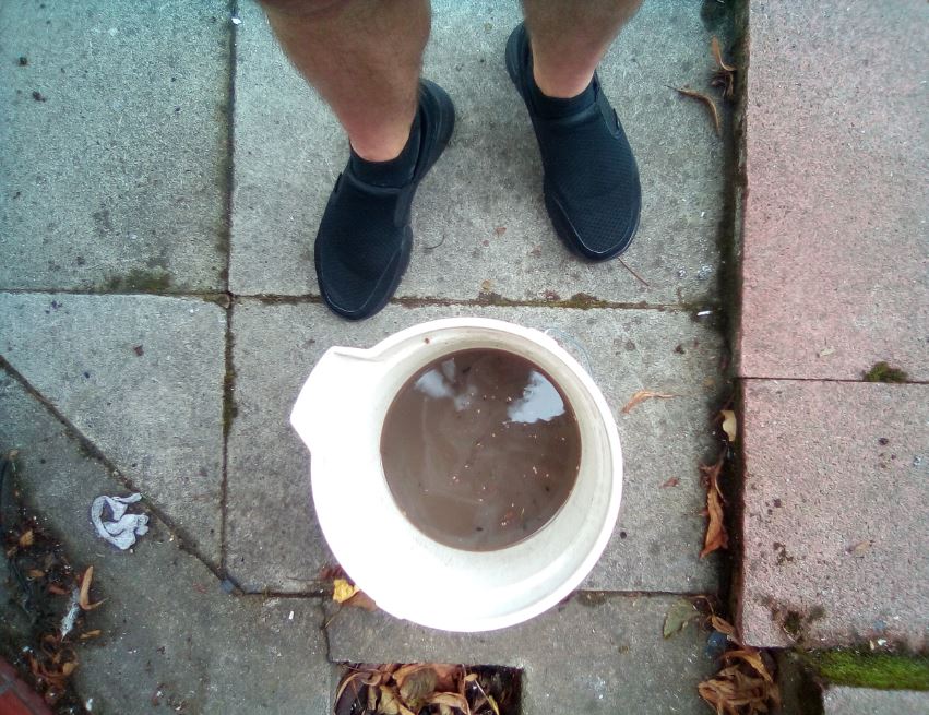 Dirty water in bucket