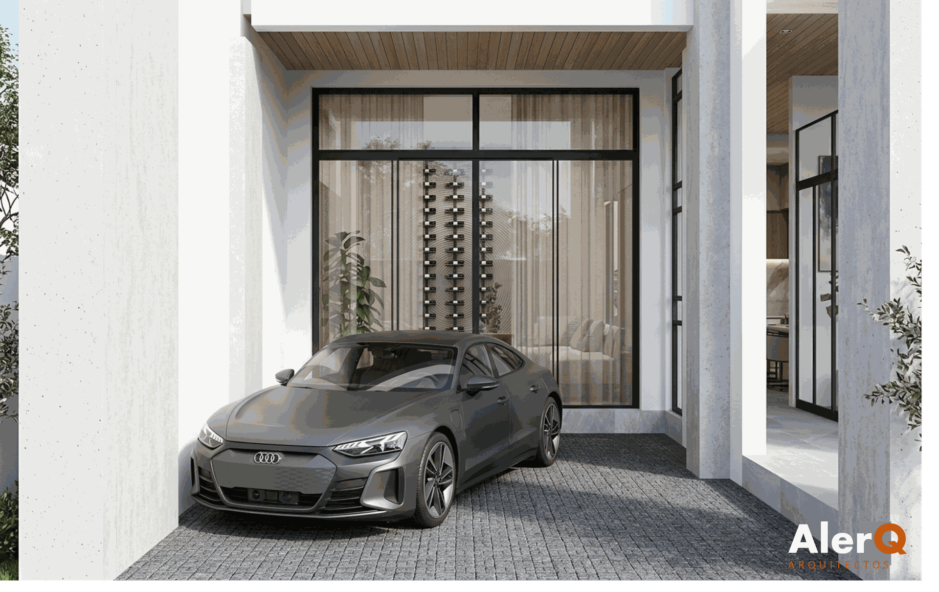 Coche deportivo gris aparcado en una cochera de un moderno edificio