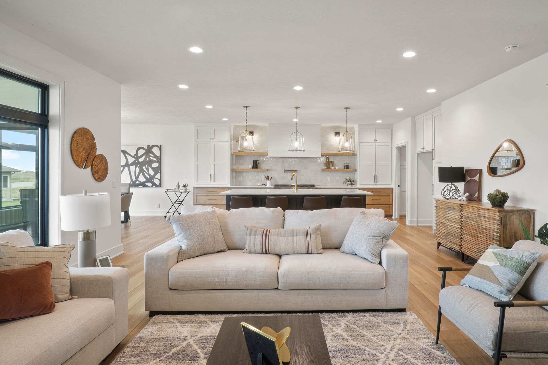 A living room with a couch , coffee table , and television.