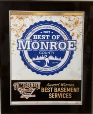 Framed “Best of Monroe County 2021” award plaque for basement services, blue and black with gold accents