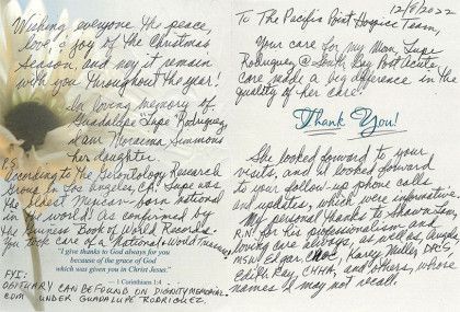 Handwritten note with cursive text and a blue “Thank You” greeting, on a light floral background