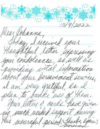 Handwritten thank-you letter on lined paper with blue floral border and date 12/9/2022.