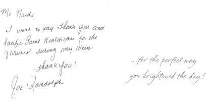 Handwritten thank-you note on white paper, signed in cursive, with a short message on the right.