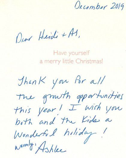 Handwritten Christmas note on white paper, dated December 2019, with a festive greeting.