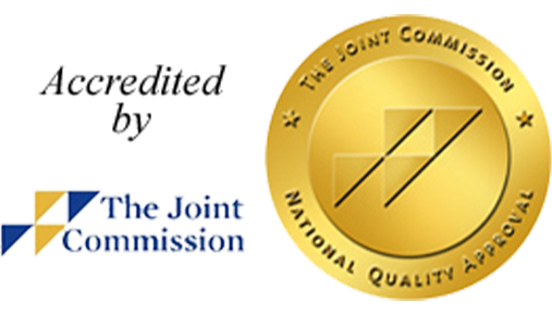 Accredited by The Joint Commission logo with gold seal and blue text.
