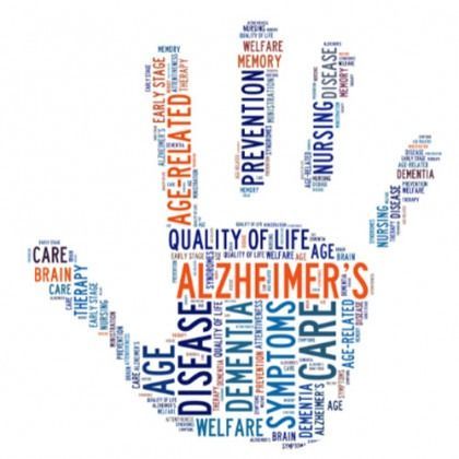 Word cloud hand labeled “ALZHEIMER’S” with terms like dementia, memory, care, and disease in blue and orange.