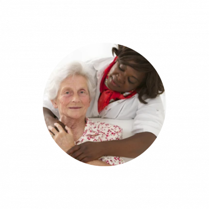 Two hands gently holding an elderly person's hand in a supportive gesture