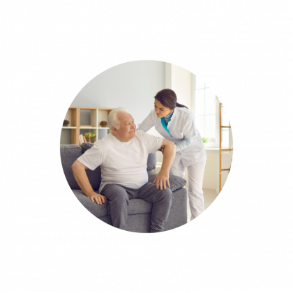 Two hands gently holding an elderly person's hand in a supportive gesture